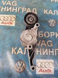 Натяжитель ремня обводного на Volkswagen Passat B6