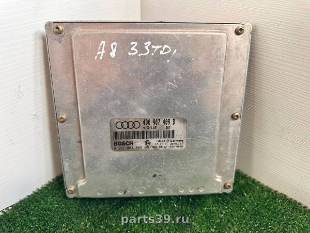 Блок управления двигателя ECU на Audi A8 D2/4D