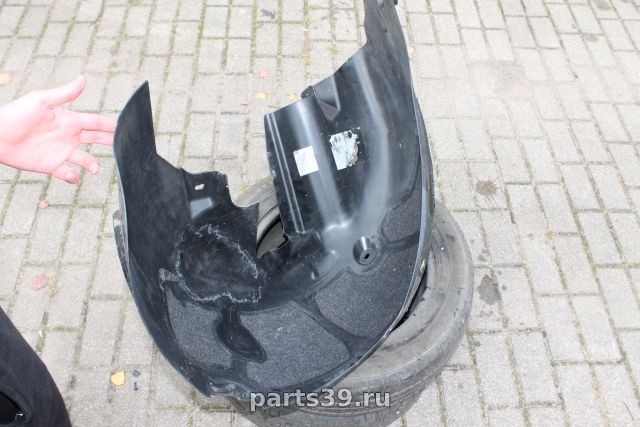 Подкрылок задний Лев.